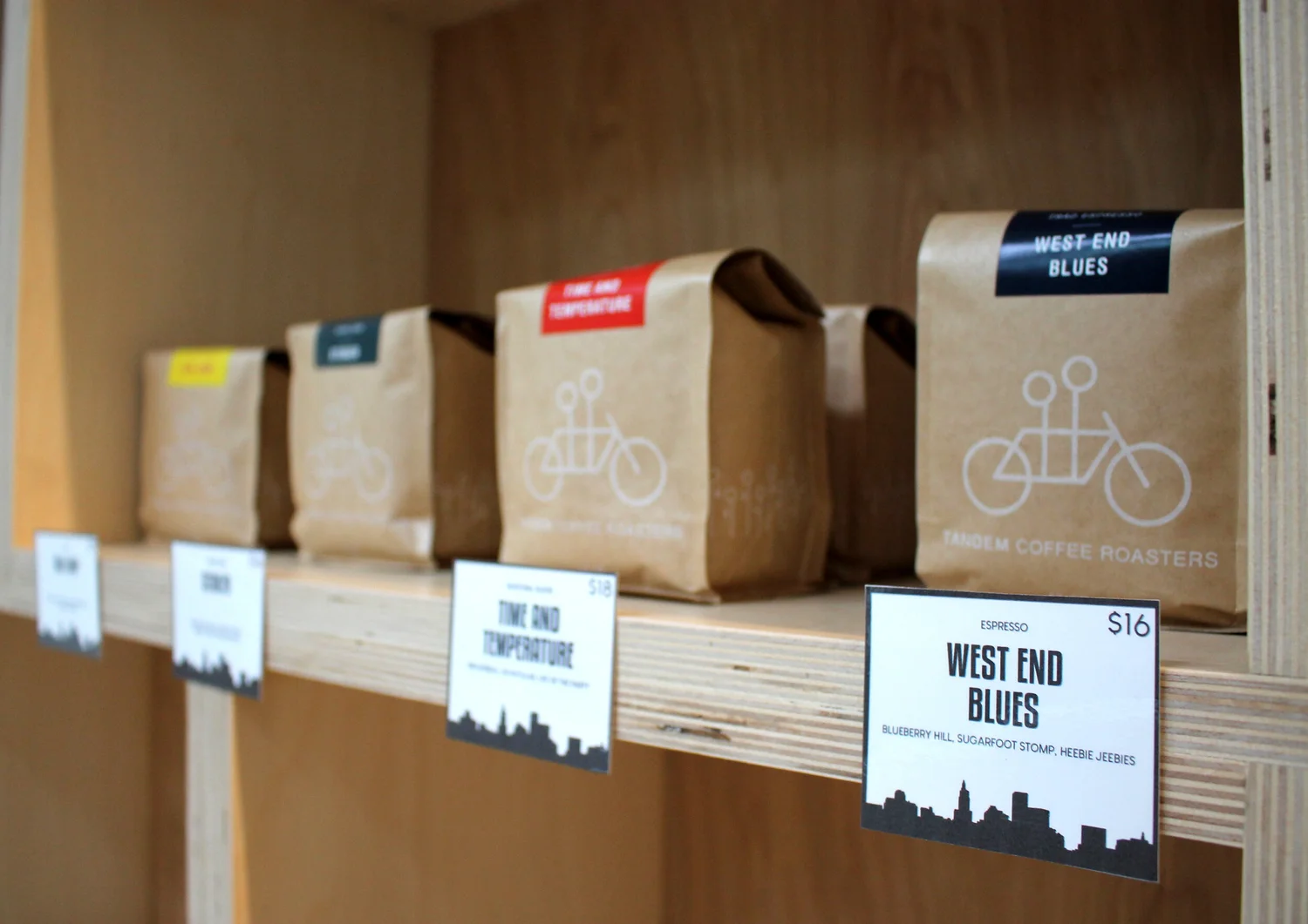 Tandem Coffee Roasters bags on shelf at Little City